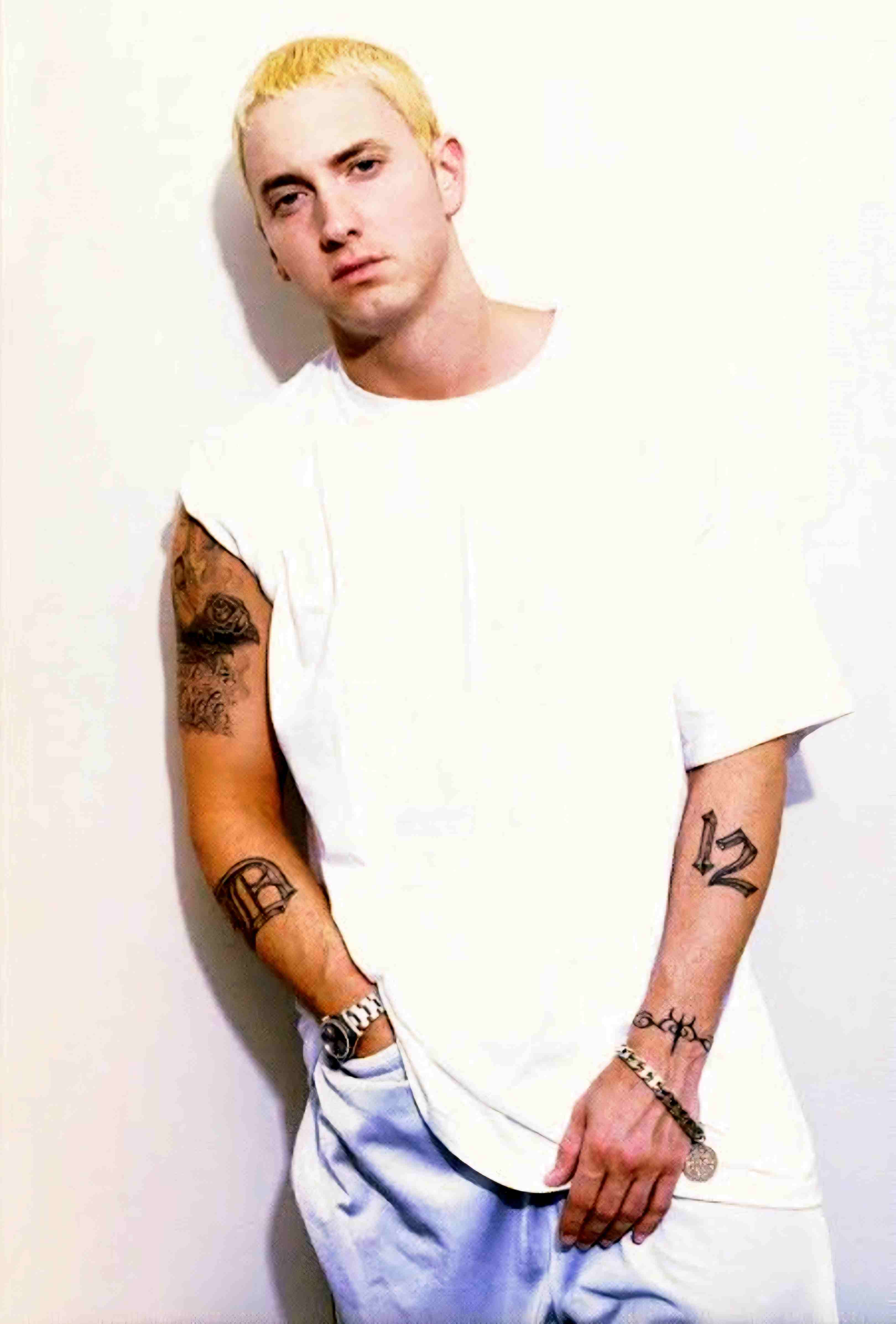 Eminem 1999 Slim Shady look with white T-shirt and blonde hair