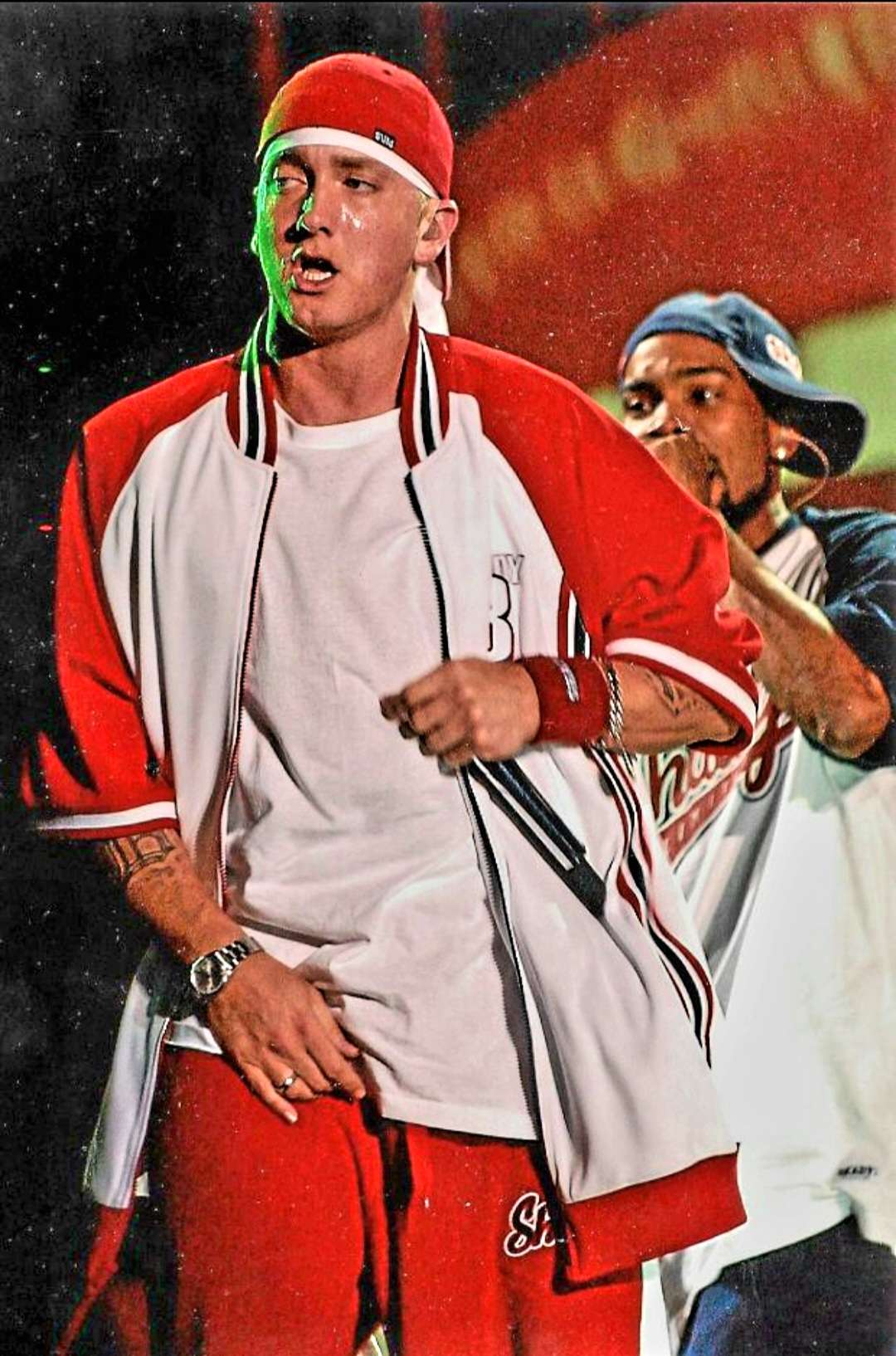 Eminem white T-shirt and red sweatband on stage