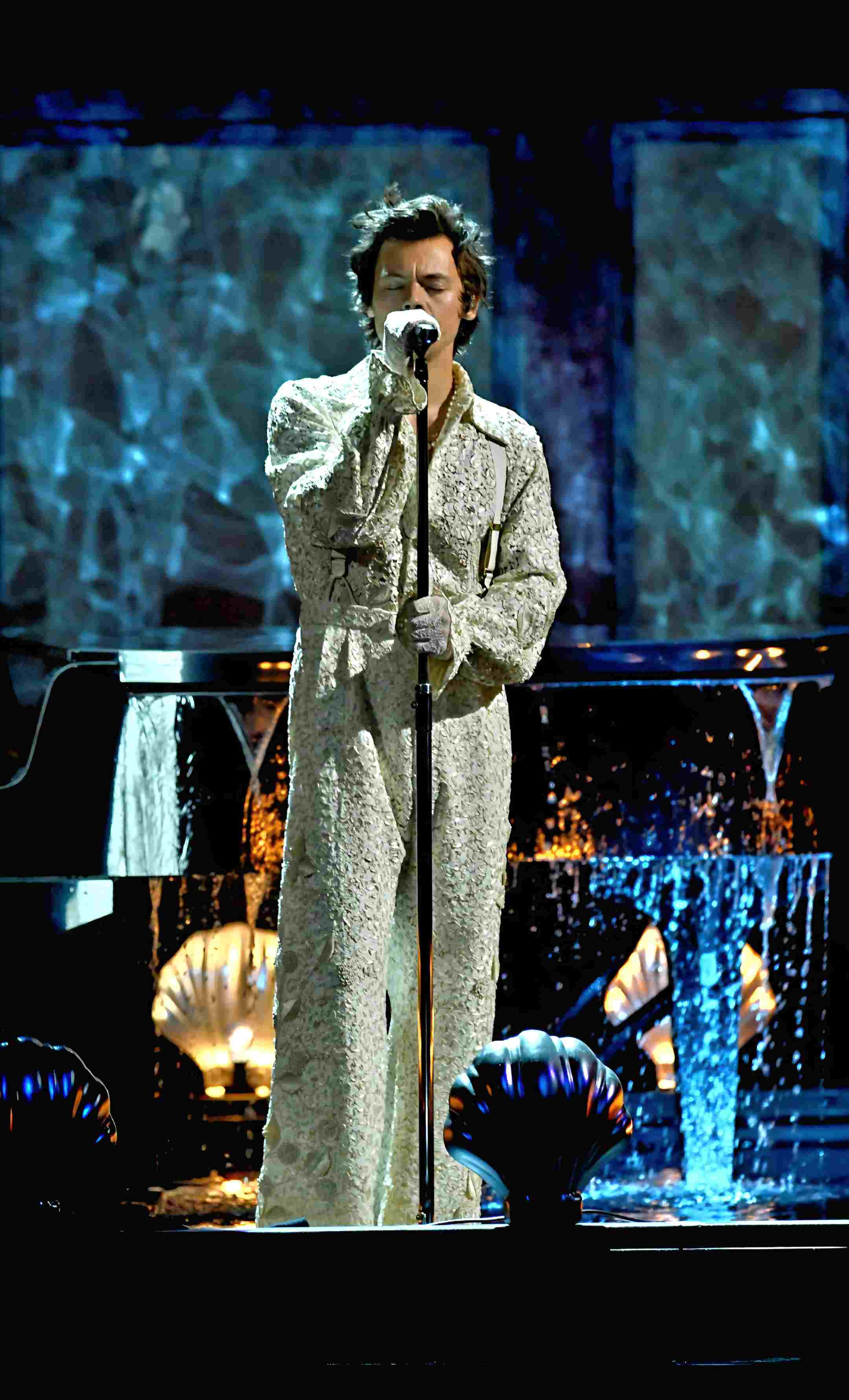 Harry Styles wearing white lace shirt at BRIT Awards