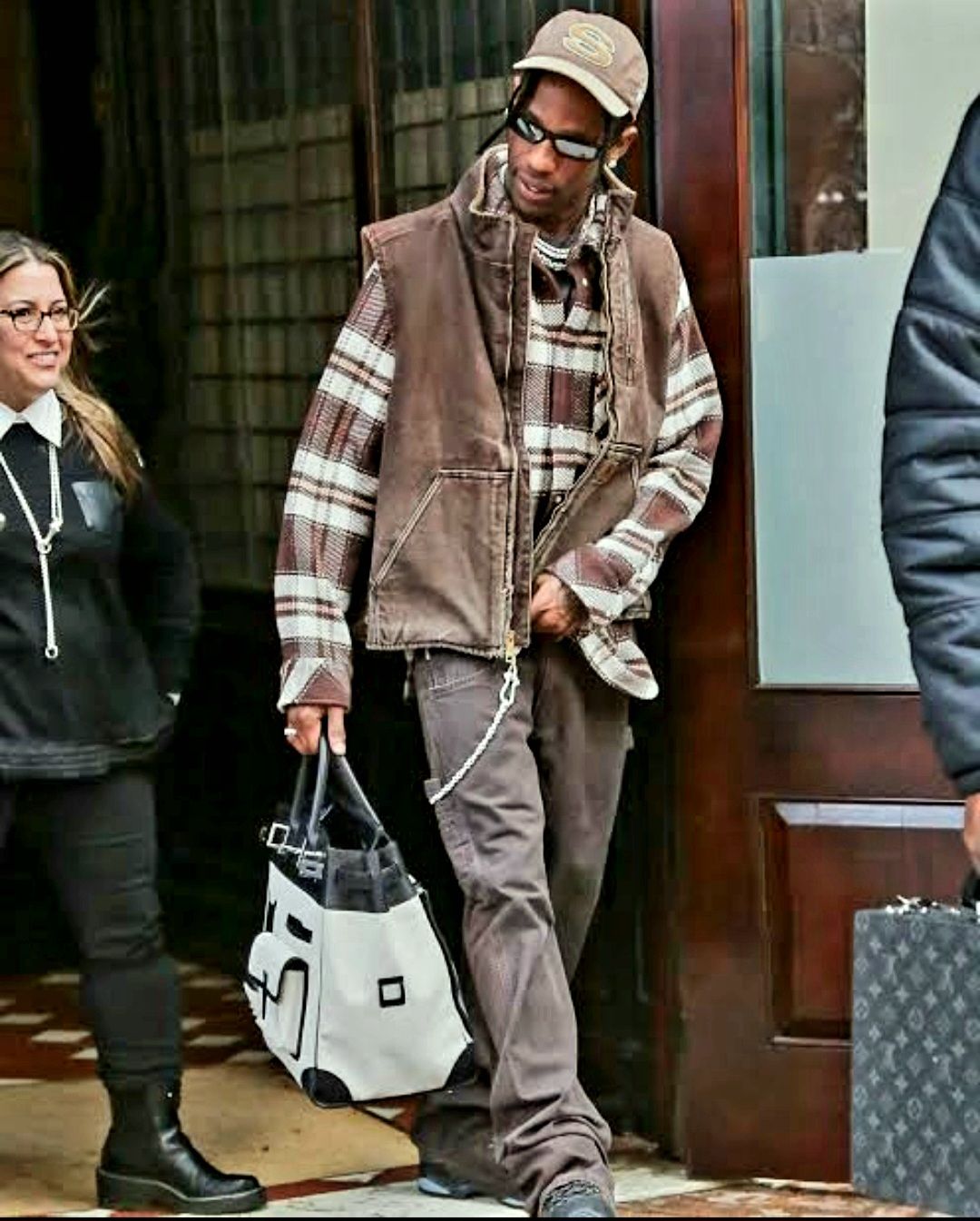 Travis Scott brown flannel shirt street style